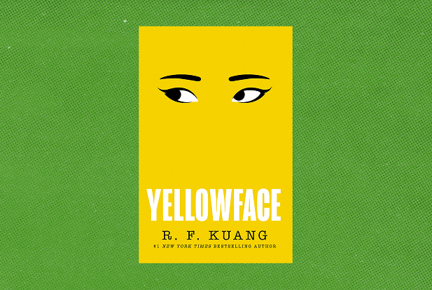 Person sitting by window working on tablet