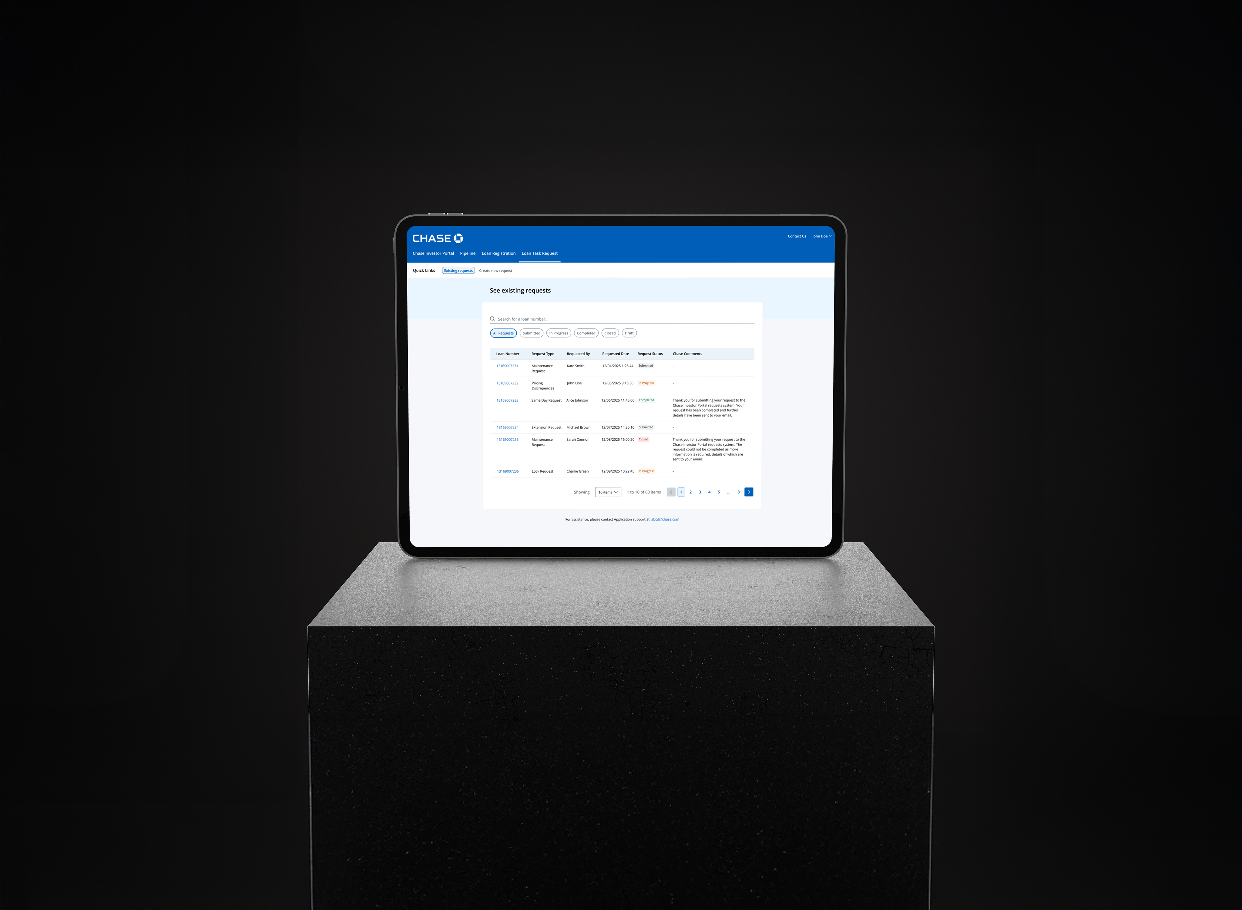 Person sitting by window working on tablet